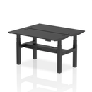 Black Dynamic Air 2-person back-to-back slimline height adjustable bench desk with a sleek black finish.