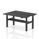 Black Dynamic Air 2-person back-to-back slimline height adjustable bench desk with a sleek black finish