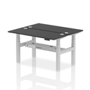 Black Dynamic Air 2 person back-to-back slimline height adjustable bench desk showing the sleek black finish and adjustable height features.