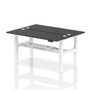 Black and white 2-person back-to-back slimline height adjustable bench desk by Dynamic, suitable for office or workspace settings.