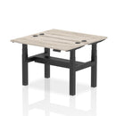 Dynamic Air 2 Person Back-to-Back Slimline Height Adjustable Office Bench in grey oak wood finish, showing the sleek, modern design.