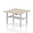 Dynamic Air 2 Person Back-to-Back Slimline Height Adjustable Bench in Grey Oak, with ergonomic design and modern finish.