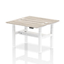 Dynamic Air 2 Person Back-to-Back Slimline Height Adjustable Desk Bench in grey oak wood finish, showing the modern ergonomic design.