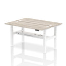 Grey oak Dynamic Air 2-person back-to-back slimline height-adjustable desk bench showing modern design and sturdy construction.