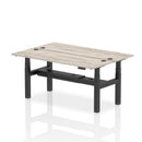 Grey oak Dynamic Air 2-person back-to-back slimline height adjustable desk bench with modern design and ergonomic features.