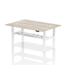 Dynamic Air 2 Person Back-to-Back Slimline Height Adjustable Desk Bench in Grey Oak with modern design and ergonomic features.