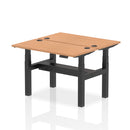 Dynamic Air 2-person back-to-back slimline height adjustable oak desk bench with modern design and sturdy construction.