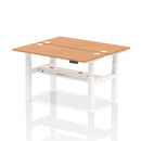 Dynamic Air 2-person back-to-back slimline height-adjustable oak desk bench showing sleek wooden surface and modern design.
