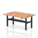 Dynamic Air 2-person back-to-back slimline height adjustable oak desk bench showing its modern wooden design and adjustable features.