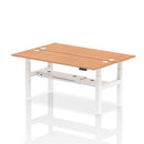 Dynamic Air 2-person back-to-back slimline height adjustable oak desk bench showing its sleek wooden surface and adjustable legs.