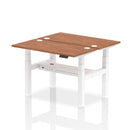 Dynamic Air 2-person back-to-back slimline height adjustable bench desk with walnut finish, showing its modern design and adjustable features.