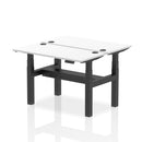White Dynamic Air 2 Person Back-to-Back Slimline Height Adjustable Bench desk with sturdy metal frame and padded seating.
