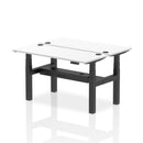 White Air 2-person back-to-back slimline height adjustable bench desk by Dynamic, showing a modern ergonomic workspace setup.