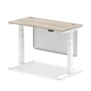 Gray oak height adjustable desk with cable ports, steel modesty panel, and Dynamic branding, featuring a 600mm deep workspace.