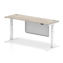 Grey oak height adjustable desk with steel modesty panel, cable ports, and dynamic brand logo, featuring a sleek modern design.