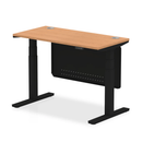 Dynamic Air 600mm deep height adjustable desk in oak with cable ports and steel modesty panel, shown with black frame.