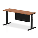 Dynamic Air 600mm deep height adjustable desk with cable ports and steel modesty panel in walnut finish.