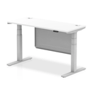 White Dynamic Air 600mm deep height adjustable desk with cable ports and steel modesty panel, showcasing a modern workspace setup.