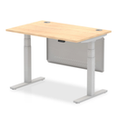 Dynamic Air 800mm deep height-adjustable desk in maple with cable ports and steel modesty panel, showcasing the workspace setup.