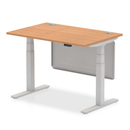Dynamic Air 800mm deep height adjustable oak desk with cable ports and steel modesty panel, suitable for versatile office use.