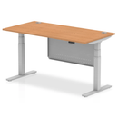 Dynamic Air 800mm deep height adjustable oak desk with cable ports and steel modesty panel, designed for ergonomic workspace setup.