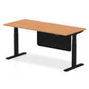 Dynamic Air 800mm deep height adjustable desk in oak with cable ports and steel modesty panel, shown from a side view.