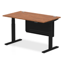 Dynamic Air 800mm deep height-adjustable desk with steel modesty panel and cable ports in walnut finish.