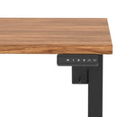 Height adjustable desk with scalloped walnut edge from Dynamic Air Lite series, showcasing a modern ergonomic workspace.