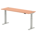 Height adjustable beech wood desk by Dynamic with cable ports, slim profile, and modern design for workspace flexibility.