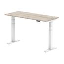 Dynamic Air Slimline height adjustable desk in grey oak with cable ports, featuring a modern design and sleek finish.