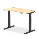 Dynamic Air Slimline height adjustable desk with cable ports in maple finish, featuring a sleek modern design and clean lines.