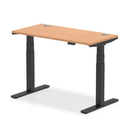 Dynamic Air Slimline height adjustable desk in oak finish with cable ports, featuring a sleek design and modern workspace solution.
