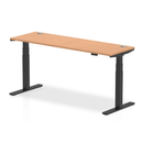 Dynamic Air Slimline height adjustable desk in oak finish with cable ports, featuring a sleek, modern design and adjustable height functionality.