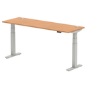 Dynamic Air Slimline height adjustable desk in oak with cable ports, featuring a sleek design and modern functionality.