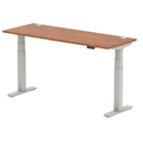 Dynamic Air Slimline height adjustable desk in walnut finish with cable ports and sleek design.