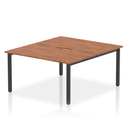 Dynamic Evolve Plus B2B 2-person walnut desk bench with sleek wood finish and sturdy frame, ideal for collaborative office spaces.