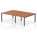 Dark walnut Evolve Plus B2B 4-person bench desk by Dynamic, showcasing a sleek, modern design with sturdy wooden construction.