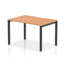 Dynamic Evolve Plus Single Starter Bench Desk in Oak with black frame, showcasing a modern, minimalist office workspace.