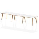 Dynamic Oslo 3-person single row desk in wood finish, showing a spacious workspace with three chairs and clean modern design.