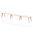 Dynamic Oslo 3-person single row desk showing a spacious wooden tabletop with metal legs and ample workspace for three users.