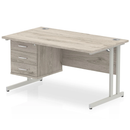 Dynamic Impulse cantilever straight desk with fixed grey oak pedestal, featuring a sleek modern design and sturdy construction.