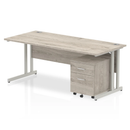 Grey oak Impulse cantilever straight desk by Dynamic with two-drawer mobile pedestal, featuring a modern office workspace.
