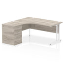 Dynamic Impulse Crescent Desk with 600mm deep high pedestal in grey oak finish, showcasing modern office workspace design.