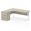 Dynamic Impulse Crescent Desk with 600mm deep high pedestal in grey oak finish, showing the sleek curved desk and storage unit.