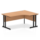 Dynamic Impulse Crescent Desk with oak finish and cantilever legs, showcasing a modern office workspace.