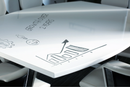 White high gloss writable boardroom table by Dynamic, with a sleek, reflective surface ideal for meetings and collaborative spaces.