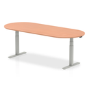 Impulse height adjustable boardroom table in beech finish by Dynamic, shown with silver frame and sleek design.