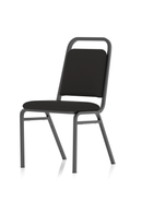 Black fabric banqueting stacking visitor chair with a black frame by Dynamic, shown in a neat, stackable arrangement.