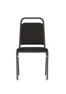 Black fabric banqueting stacking visitor chair with a black frame by Dynamic, showing a side view of the chair for event seating.
