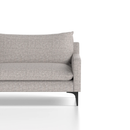 Dynamic Emmy cushioned 3-seater sofa with plush fabric and modern design, shown in a cozy living room setting.